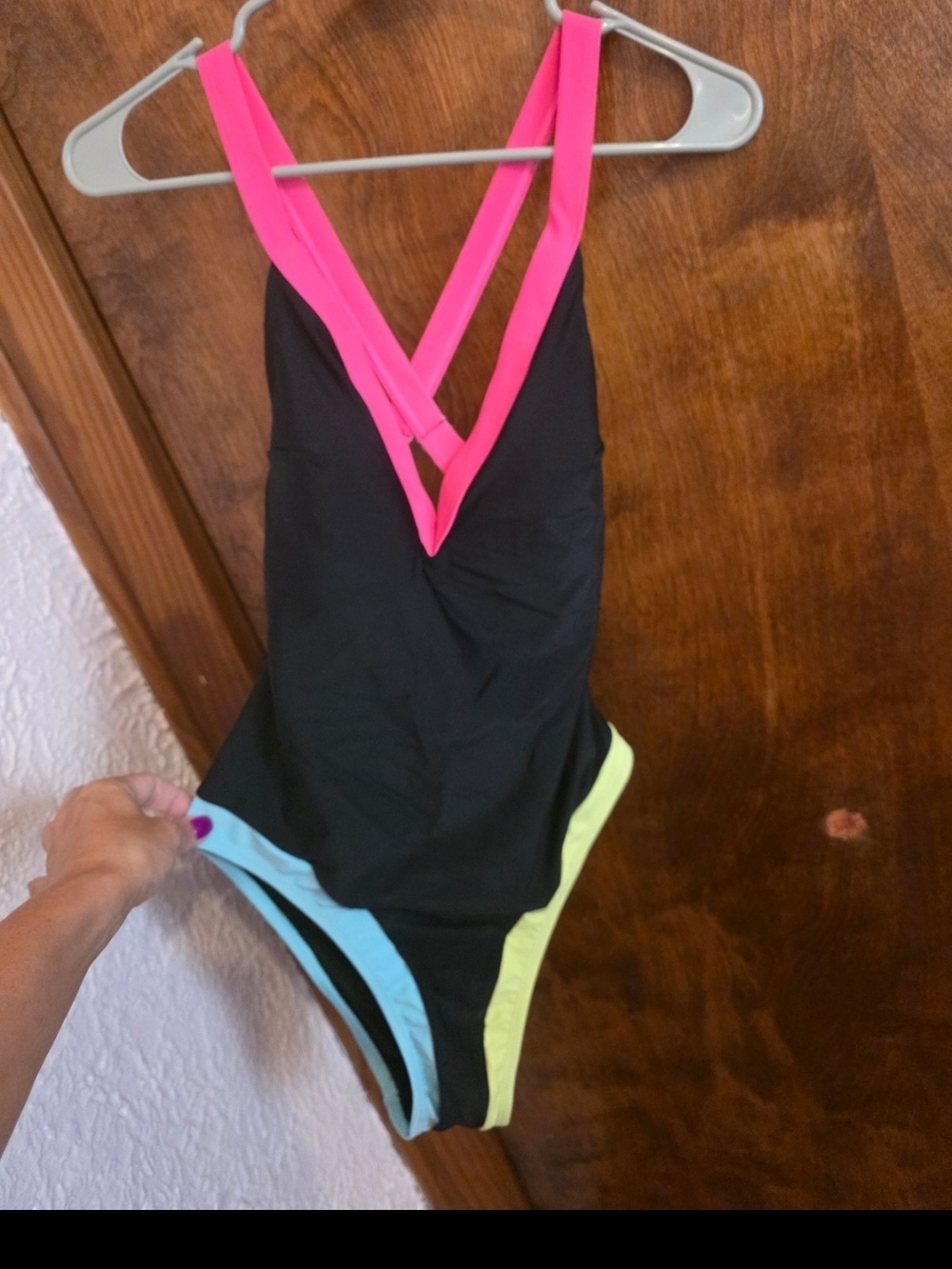 CusheBlack One-Piece with Neon Pink, Light Blue, and Yellow Accents